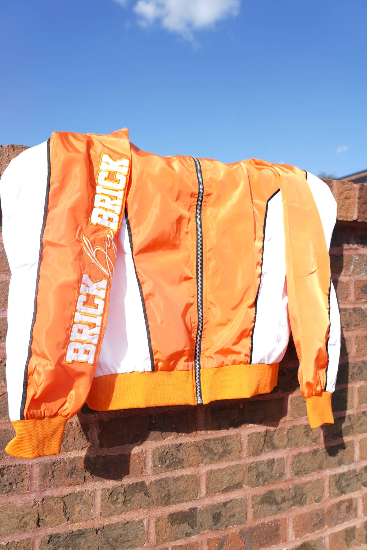 Brick By Brick Windbreaker - Orange/White