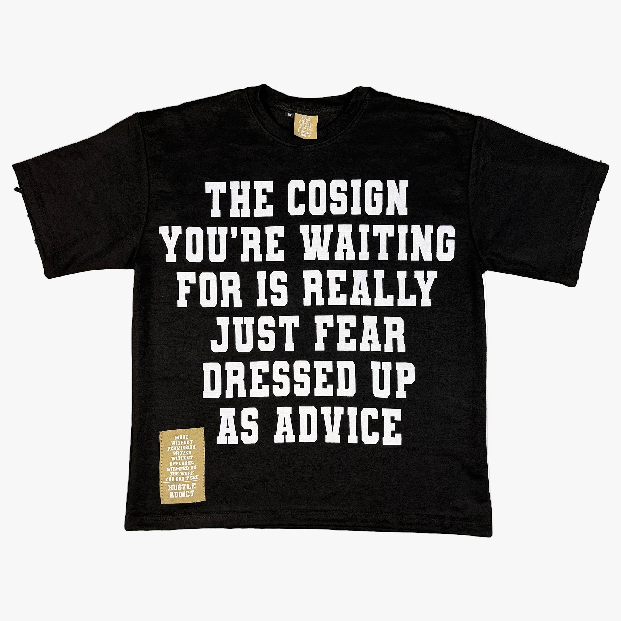 Black t-shirt with white text "The Cosign You're waiting for is really just fear dressed up as advice" on a white background